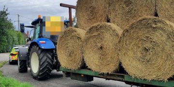 Police stop farmer transporting hay without securing the load