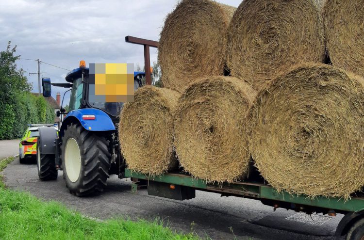 Police stop farmer transporting hay without securing the load