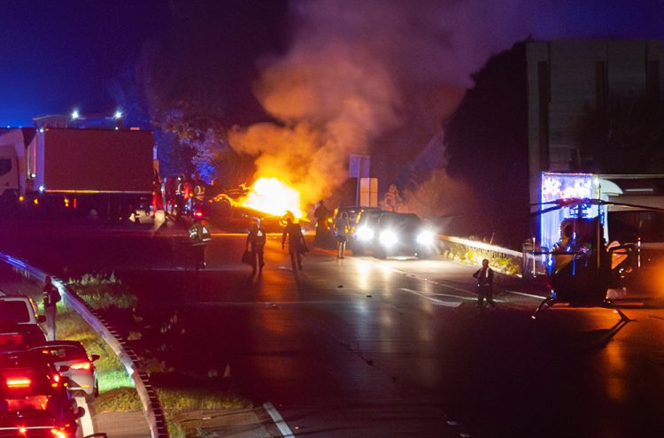 M4 crash: Car overturns and bursts into fireball as air ambulance lands