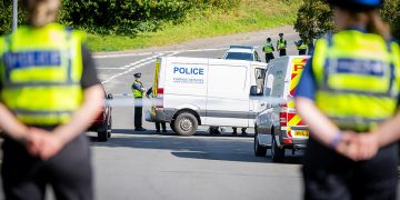 Man, 25, questioned over murder as probe into knife attack continues