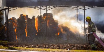 Firefighters battle barn fire near Devizes as locals told to close windows