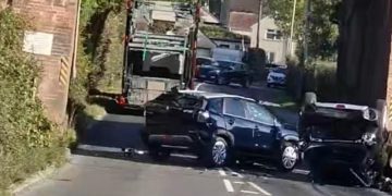 Car transporter lorry sheds load in Trowbridge railway bridge crash