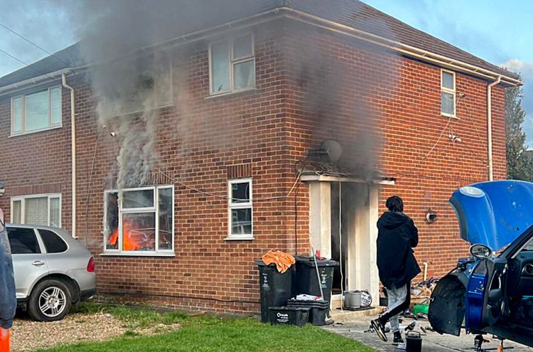 Firefighters battle blaze at Swindon house as road partially blocked