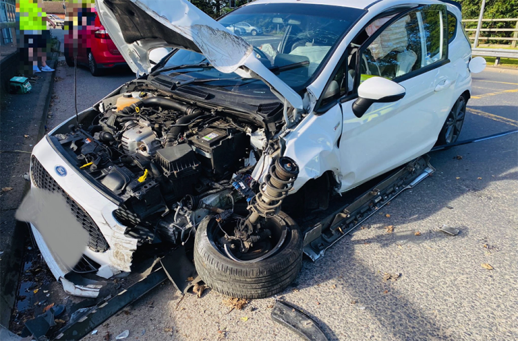 Driver ‘denies speeding’ despite destroying car in roundabout wall crash