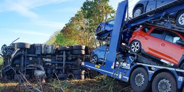 M4: Loaded car transporter crashes off motorway causing major delays