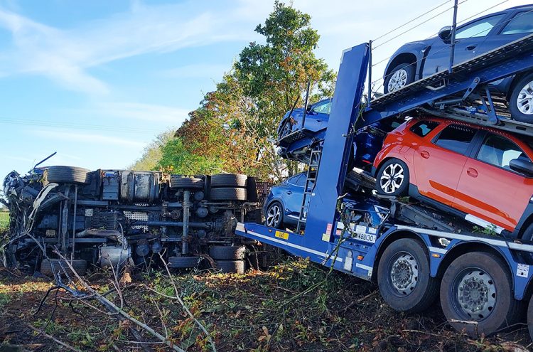M4: Loaded car transporter crashes off motorway causing major delays
