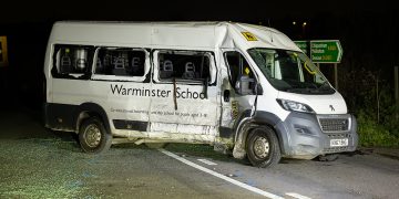 Minibus overturns in crash with lorry on A350 – several children injured