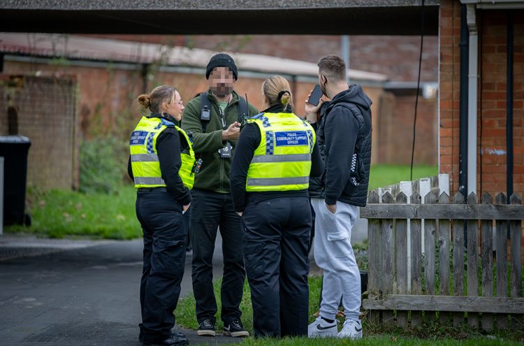 Police swoop on Swindon street as ambulance crews attend property