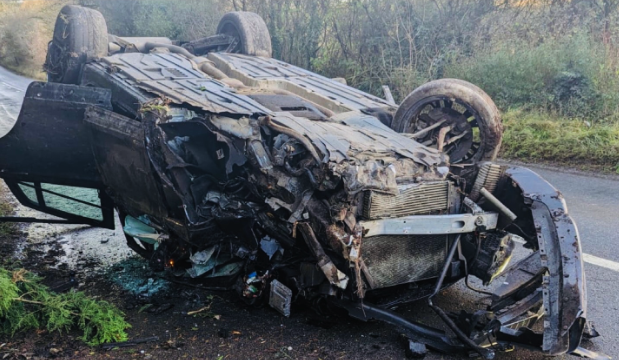 BMW driver arrested after crashing into tree during overtake attempt