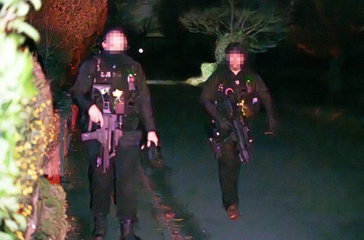 Man found dead after armed police storm Wiltshire village wood