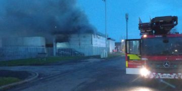 Police shut road as firefighters battle industrial blaze in Swindon