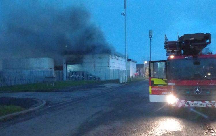 Police shut road as firefighters battle industrial blaze in Swindon