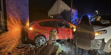 Woman in hospital after car collides with house in Wiltshire village