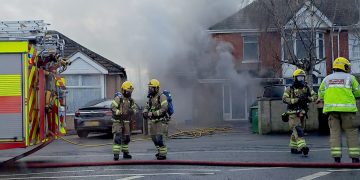 Firefighters tackle blaze at house on major route in Swindon
