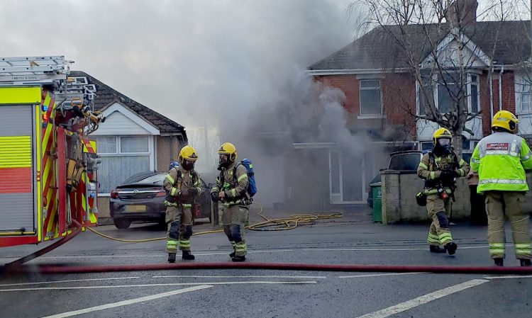 Firefighters tackle blaze at house on major route in Swindon