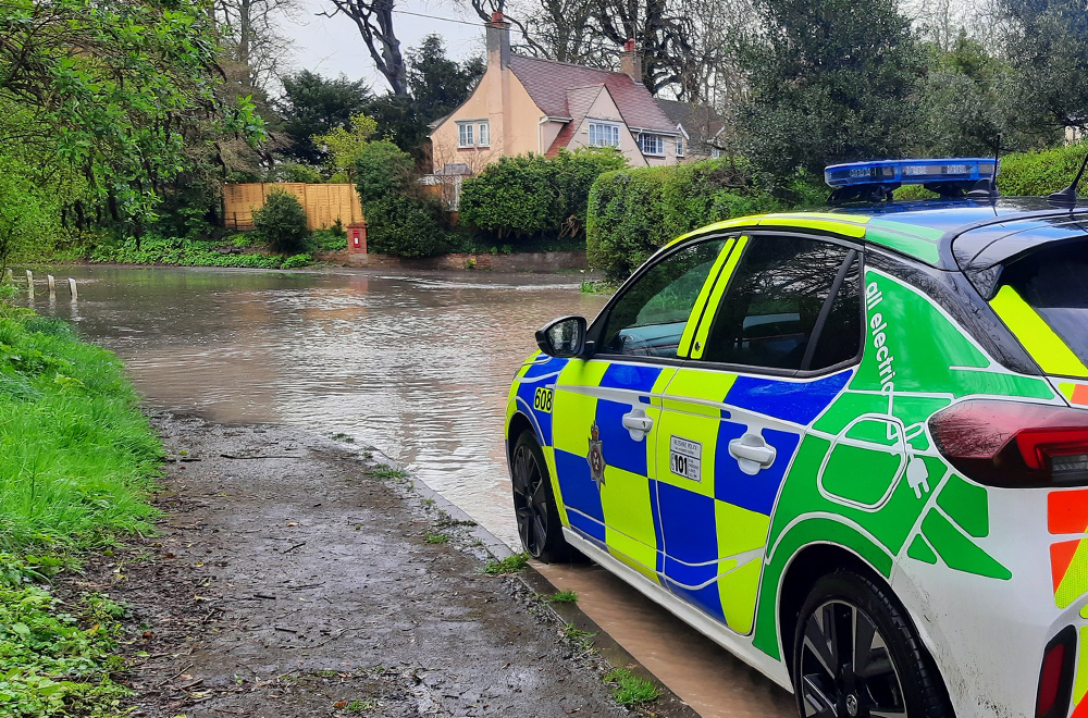 Police tell motorists to make only 'essential journeys' after heavy rain 