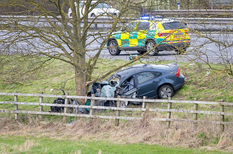 Woman dies in M4 crash as two others suffer life-threatening injuries
