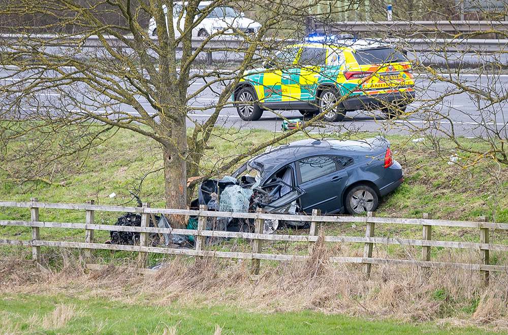 Woman dies in M4 crash as two others suffer life-threatening injuries