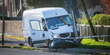 Road closure and power cut as van smashes into telegraph pole