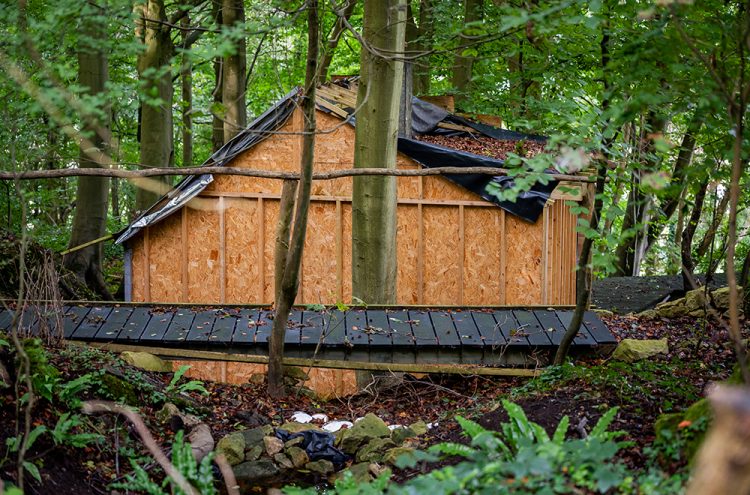 Man ordered to knock down unlawful buildings in Wiltshire woods