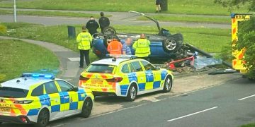 Manhunt in Swindon after car overturns and destroys bus shelter