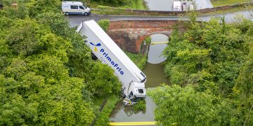 Lorry careers into canal – Wiltshire road shut for ‘prolonged period’