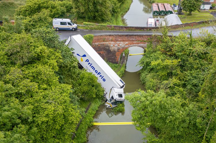 Lorry careers into canal – Wiltshire road shut for ‘prolonged period’