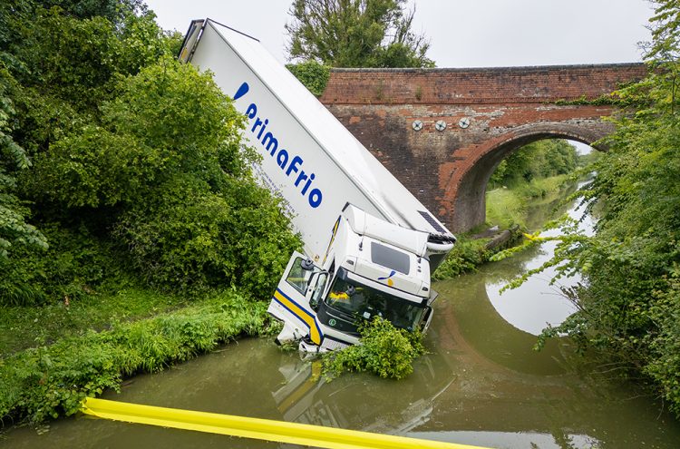 Lorry careers into canal – Wiltshire road shut for ‘prolonged period’