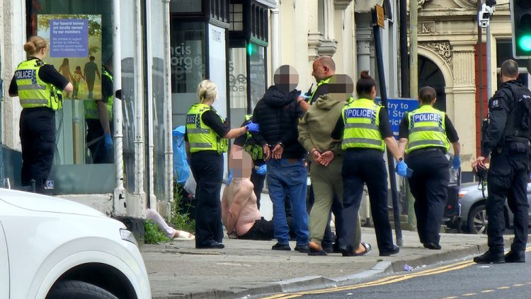 Woman robbed at knifepoint in Swindon as police arrest three men