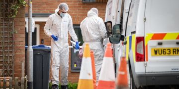 Sombre moment dogs are removed from Easterton murder scene