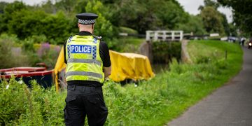 Police guard boat on Devizes canal after woman injured in assault