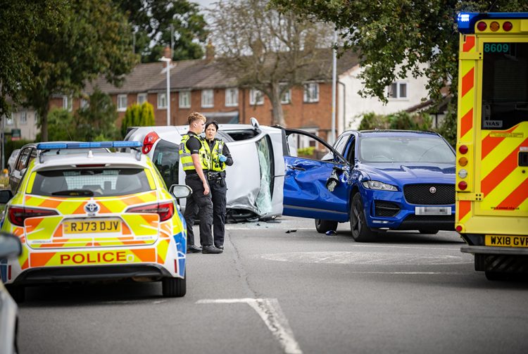Car flips in dramatic Swindon crash as driver ‘hides in wheelie bin’