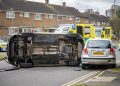 Car flips in dramatic Swindon crash as driver ‘hides in wheelie bin’