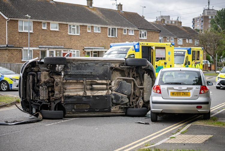 Car flips in dramatic Swindon crash as driver ‘hides in wheelie bin’