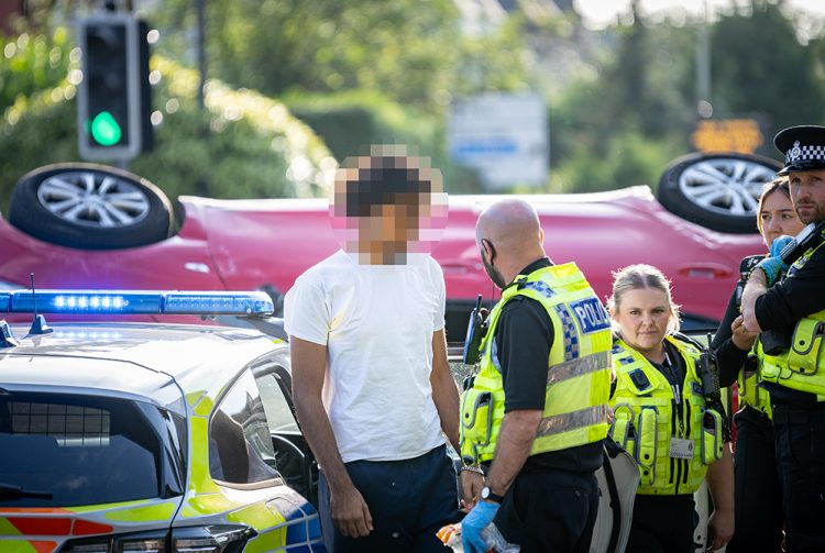 Driver arrested after car overturns in dramatic Swindon smash