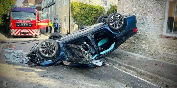 Driver arrested after flipping car onto roof in quaint Wiltshire town