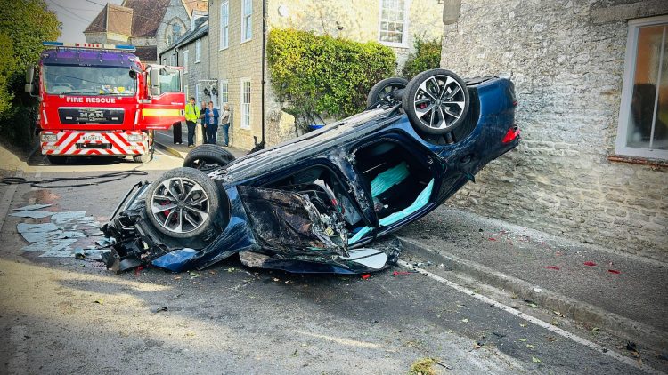 Driver arrested after flipping car onto roof in quaint Wiltshire town