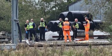 Workers discover dead body on railway line near Swindon