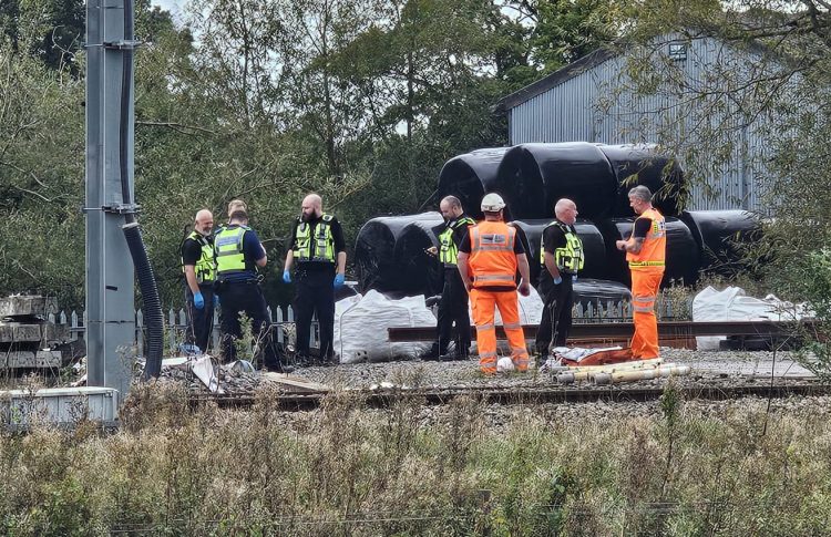 Workers discover dead body on railway line near Swindon