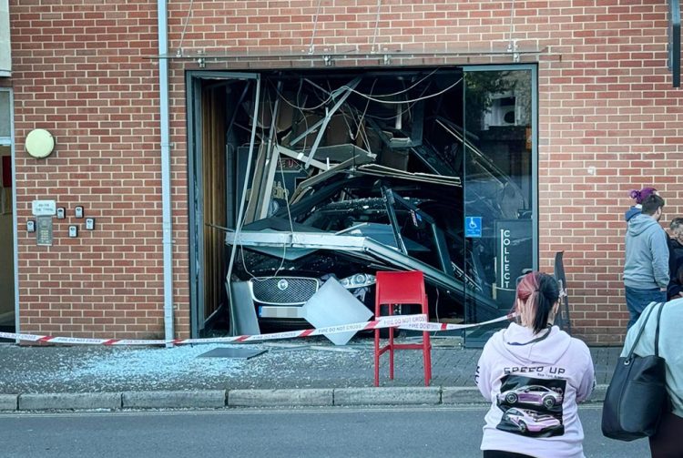 Domin-oh-oops: Driver crashes car through Domino’s store
