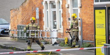 Firefighters tackle blaze in flats behind Swindon pharmacy