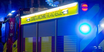 Woman hospitalised after blaze breaks out in Swindon home