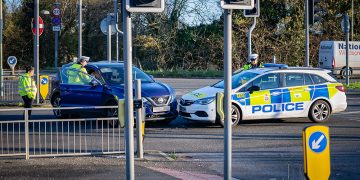 Police car involved in crash on junction near Swindon hospital