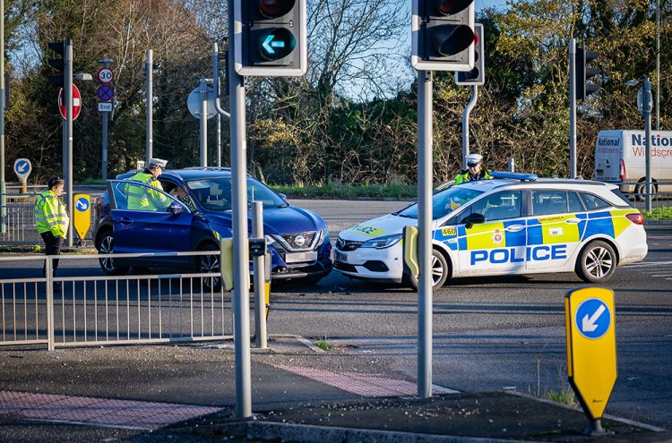 Police car involved in crash on junction near Swindon hospital