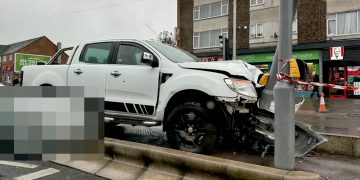 Man in hospital after truck ploughs into Swindon traffic island