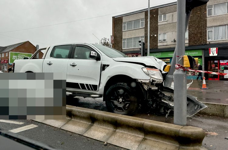 Man in hospital after truck ploughs into Swindon traffic island