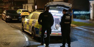 Police smash down door of Swindon home in suspected raid