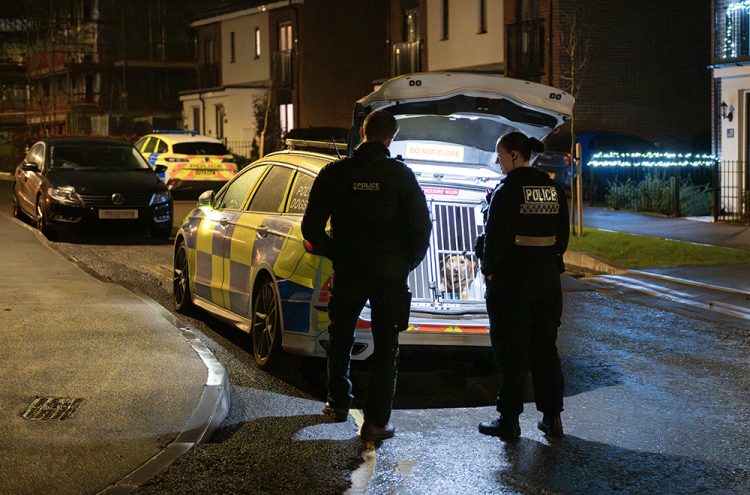 Police smash down door of Swindon home in suspected raid
