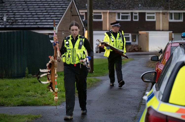 Police remove ceremonial weapons after man found dead