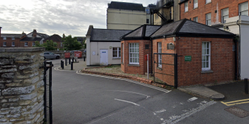 Man in ski mask robs woman of handbag outside bank in Swindon